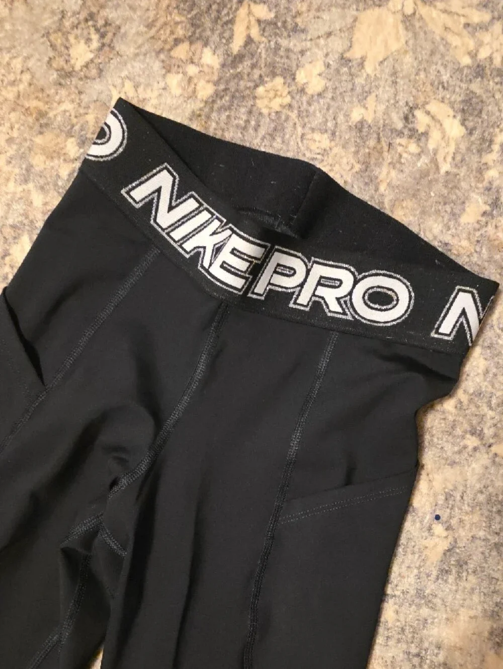 Nike Black Kids Performance Leggings with Silver Swoosh